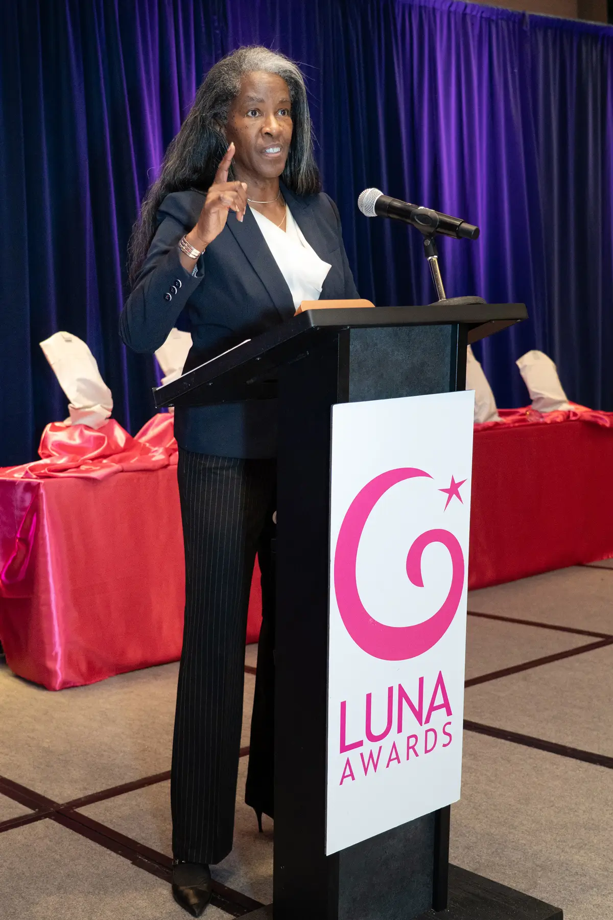 Helen Callier speaking at RHCA Luna Awards Houston Luncheon 2025