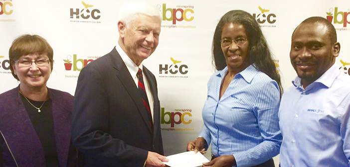 Permit Us Now team delivering first sponsorship check in 2017 to HCC